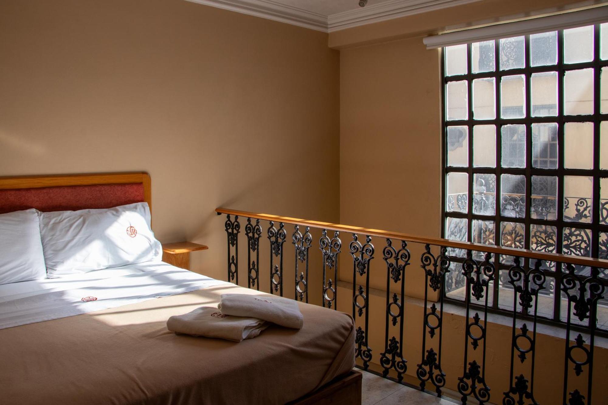 Suites Sevilla Puebla Exterior photo